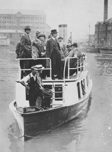 image Minister of Transport - Dr Leslie Burgin - inspecting the River Severn & Sharpness Canal, August 1938. Photo taken in Gloucester Docks.