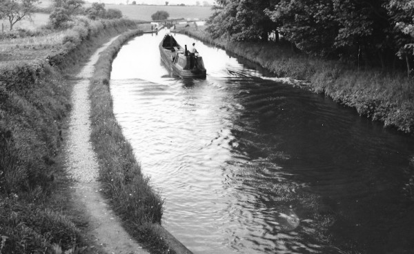 image Shropshire Union Canal - Main Line. Working boat going North through Tyreley Locks. 